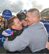 18 April 2022; Jockey Paddy O'Hanlon, centre, celebrates with trainer Dermot Anthony McLoughlin, left, and owner Pat Blake after sending out Lord Lariat to win the BoyleSports Irish Grand National Steeplechase during day three of the Fairyhouse Easter Festival at Fairyhouse Racecourse in Ratoath, Meath. Photo by Seb Daly/Sportsfile