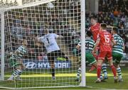 18 April 2022; Daniel Kelly of Dundalk has a header on goal saved by Shamrock Rovers goalkeeper Alan Mannus during the SSE Airtricity League Premier Division match between Shamrock Rovers and Dundalk at Tallaght Stadium in Dublin. Photo by Eóin Noonan/Sportsfile