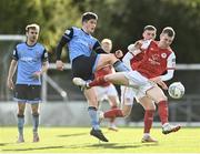 18 April 2022; Mark Doyle of St Patrick's Athletic in action against Colm Whelan of UCD during the SSE Airtricity League Premier Division match between UCD and St Patrick's Athletic at UCD Bowl in Belfield, Dublin. Photo by David Fitzgerald/Sportsfile