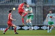 18 April 2022; Paul Doyle of Dundalk in action against Sean Hoare of Shamrock Rovers during the SSE Airtricity League Premier Division match between Shamrock Rovers and Dundalk at Tallaght Stadium in Dublin. Photo by Eóin Noonan/Sportsfile