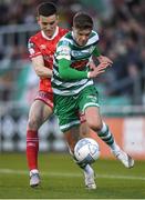 18 April 2022; Sean Gannon of Shamrock Rovers in action against Darragh Leahy of Dundalk during the SSE Airtricity League Premier Division match between Shamrock Rovers and Dundalk at Tallaght Stadium in Dublin. Photo by Eóin Noonan/Sportsfile