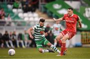 18 April 2022; Danny Mandroiu of Shamrock Rovers is tackled by Brian Gartland of Dundalk during the SSE Airtricity League Premier Division match between Shamrock Rovers and Dundalk at Tallaght Stadium in Dublin.  Photo by Eóin Noonan/Sportsfile