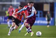 18 April 2022; Dylan Grimes of Drogheda United in action against Daniel Lafferty of Derry City during the SSE Airtricity League Premier Division match between Drogheda United and Derry City at Head in the Game Park in Drogheda, Louth. Photo by Ben McShane/Sportsfile