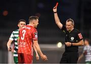 18 April 2022; Brian Gartland of Dundalk is shown a red card by referee Ray Matthews during the SSE Airtricity League Premier Division match between Shamrock Rovers and Dundalk at Tallaght Stadium in Dublin.  Photo by Eóin Noonan/Sportsfile