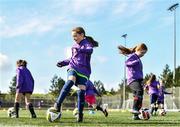 19 April 2022; Lily Bennett, aged 8, from Balgriffin in Dublin, second from left, during the AVIVA Soccer Sisters Easter Camp at Gannon Park in Malahide, Dublin. Photo by Sam Barnes/Sportsfile