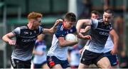 17 April 2022; Mikey Brosnan of New York in action against Sean Carrabine, left, and Paul Kilcoyne of Sligo during the Connacht GAA Football Senior Championship Quarter-Final match between New York and Sligo at Gaelic Park in New York, USA. Photo by Daire Brennan/Sportsfile