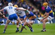 17 April 2022; Cathal Barrett of Tipperary is tackled by Shane Bennett of Waterford, 19, during the Munster GAA Hurling Senior Championship Round 1 match between Waterford and Tipperary at Walsh Park in Waterford. Photo by Piaras Ó Mídheach/Sportsfile