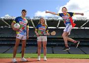 20 April 2022; Kellogg and the GAA have today announced the most hotly anticipated summer camp, Kellogg’s GAA Cúl Camps, has returned for 2022. The Camps are anticipating an extra level of excitement this year with numbers back at full capacity across the country following Covid restrictions. Camps will kick off on Monday, June 27th and will run up to August 26th. GAA clubs across the country are set to be a hive of activity this summer with bookings for participants aged 6-13 now open. For more information visit: www.gaa.ie/kelloggsculcamps. Our picture shows Mayo footballer Tommy Conroy, Antrim camogie player Roisin McCormick and Donnacha Lally, age 11 from Ahascragh-Fohenagh GAA, Galway, during the Launch of the 2022 Kellogg’s GAA Cúl Camps at Croke Park in Dublin. Photo by Stephen McCarthy/Sportsfile
