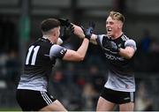 20 April 2022; Jack Davitt of Sligo, right, celebrates with team-mate Eoghann Smith at the final whistle after their sides victory in the EirGrid Connacht GAA Football Under 20 Championship Final match between Mayo and Sligo at Markievicz Park in Sligo. Photo by Sam Barnes/Sportsfile