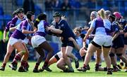 21 April 2022; Avril Whittle of North Midlands is tackled by Prudence Isaac of South East during the Leinster Rugby Under 18 Sarah Robinson Cup Final Round match between South East and North Midlands at Energia Park in Dublin. Photo by Brendan Moran/Sportsfile