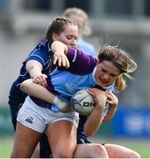 21 April 2022; Robyn O’Connor of South East is tackled by Hannah Wilson of North Midlands during the Leinster Rugby Under 18 Sarah Robinson Cup Final Round match between South East and North Midlands at Energia Park in Dublin. Photo by Brendan Moran/Sportsfile
