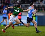 21 April 2022; Luke Breathnach of Dublin is tackled by Conor Gray of Meath during the EirGrid Leinster GAA Football U20 Championship Semi-Final match between Dublin and Meath at Parnell Park in Dublin. Photo by Ray McManus/Sportsfile