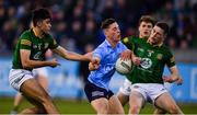 21 April 2022; Conor Tyrrell of Dublin is tackled by Liam Kelly and Mark Coffey of Meath, left, during the EirGrid Leinster GAA Football U20 Championship Semi-Final match between Dublin and Meath at Parnell Park in Dublin. Photo by Ray McManus/Sportsfile