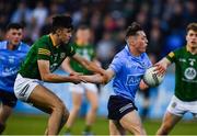 21 April 2022; Conor Tyrrell of Dublin is tackled by Mark Coffey of Meath during the EirGrid Leinster GAA Football U20 Championship Semi-Final match between Dublin and Meath at Parnell Park in Dublin. Photo by Ray McManus/Sportsfile