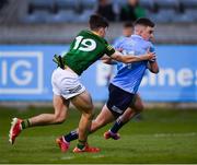 21 April 2022; Fionn Murray of Dublin is tackled by Evan Quinn of Meath during the EirGrid Leinster GAA Football U20 Championship Semi-Final match between Dublin and Meath at Parnell Park in Dublin. Photo by Ray McManus/Sportsfile