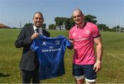 22 April 2022; Rhys Ruddock presents a Leinster Rugby jersey to Northwood School head master Paul Viljoen during a Leinster Rugby Captain's Run at Northwood School in Durban, South Africa. Photo by Harry Murphy/Sportsfile