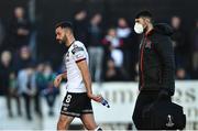 15 April 2022; Robbie Benson of Dundalk leaves the pitch to receive medical attention during the SSE Airtricity League Premier Division match between Dundalk and Sligo Rovers at Oriel Park in Dundalk, Louth. Photo by Piaras Ó Mídheach/Sportsfile