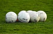 21 April 2022; Gaelic footballs, belong to Meath GAA, on the grass before the EirGrid Leinster GAA Football U20 Championship Semi-Final match between Dublin and Meath at Parnell Park in Dublin. Photo by Ray McManus/Sportsfile