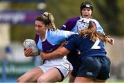 21 April 2022; Grainne Flynn of South East is tackled by Heidi Lyons and Sarah Delaney of North Midlands during the Leinster Rugby Under 18 Sarah Robinson Cup Final Round match between South East and North Midlands at Energia Park in Dublin. Photo by Brendan Moran/Sportsfile