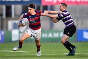 22 April 2022; Theo Connolly of Clontarf in action against Mark O'Neill of Terenure College during the Leinster Rugby Bank of Ireland Metropolitan Cup Final match between Terenure College and Clontarf at Energia Park in Dublin. Photo by Ben McShane/Sportsfile