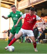 22 April 2022; Darragh Burns of St Patrick's Athletic in action against Ryan Rainey of Finn Harps during the SSE Airtricity League Premier Division match between St Patrick's Athletic and Finn Harps at Richmond Park in Dublin. Photo by Michael P Ryan/Sportsfile