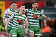 22 April 2022; Andy Lyons of Shamrock Rovers celebrates after scoring his side's first goal with team-mate Lee Grace, right, and Gary O'Neill, left, during the SSE Airtricity League Premier Division match between Bohemians and Shamrock Rovers at Dalymount Park in Dublin. Photo by Stephen McCarthy/Sportsfile