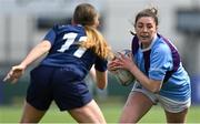 21 April 2022; Grainne Flynn of South East in action against Heidi Lyons of North Midlands during the Leinster Rugby Under 18 Sarah Robinson Cup Final Round match between South East and North Midlands at Energia Park in Dublin. Photo by Brendan Moran/Sportsfile