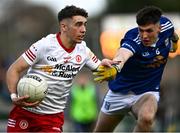 22 April 2022; James Donaghy of Tyrone in action against Cathal Leddy of Cavan during the EirGrid Ulster GAA Football U20 Championship Final match between Cavan and Tyrone at Brewster Park in Enniskillen, Fermanagh. Photo by David Fitzgerald/Sportsfile