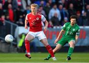 22 April 2022; Tom Grivosti of St Patrick's Athletic in action against Barry McNamee of Finn Harps during the SSE Airtricity League Premier Division match between St Patrick's Athletic and Finn Harps at Richmond Park in Dublin. Photo by Michael P Ryan/Sportsfile
