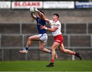 22 April 2022; Brian O'Rourke of Cavan in action against Michael McGleenan of Tyrone during the EirGrid Ulster GAA Football U20 Championship Final match between Cavan and Tyrone at Brewster Park in Enniskillen, Fermanagh. Photo by David Fitzgerald/Sportsfile