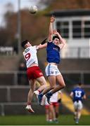 22 April 2022; Cormac McKeogh of Cavan in action against Ciarán Daly of Tyrone during the EirGrid Ulster GAA Football U20 Championship Final match between Cavan and Tyrone at Brewster Park in Enniskillen, Fermanagh. Photo by David Fitzgerald/Sportsfile