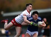 22 April 2022; Eoghan Hartin of Cavan in action against Ruairí Canavan of Tyrone during the EirGrid Ulster GAA Football U20 Championship Final match between Cavan and Tyrone at Brewster Park in Enniskillen, Fermanagh. Photo by David Fitzgerald/Sportsfile