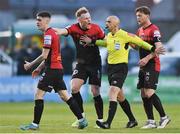 22 April 2022; Bohemians players, from left, Dawson Devoy, Ciarán Kelly and Conor Levingston remonstrate with referee Neil Doyle during the SSE Airtricity League Premier Division match between Bohemians and Shamrock Rovers at Dalymount Park in Dublin. Photo by Seb Daly/Sportsfile