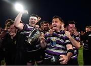 22 April 2022; Terenure College captain Niall Taylor celebrates with the cup and his teammates after the Leinster Rugby Bank of Ireland Metropolitan Cup Final match between Terenure College and Clontarf at Energia Park in Dublin. Photo by Ben McShane/Sportsfile