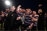 22 April 2022; Terenure College captain Niall Taylor celebrates with the cup and his teammates after the Leinster Rugby Bank of Ireland Metropolitan Cup Final match between Terenure College and Clontarf at Energia Park in Dublin. Photo by Ben McShane/Sportsfile