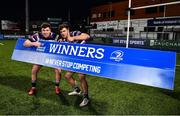 22 April 2022; Terenure College players Maxime Alric, right, and Marc Kelly of Terenure College with the &quot;Winners&quot; sign after their side's victory in the Leinster Rugby Bank of Ireland Metropolitan Cup Final match between Terenure College and Clontarf at Energia Park in Dublin. Photo by Ben McShane/Sportsfile