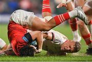 22 April 2022; Joey Carbery of Munster is tackled by Ian Madigan of Ulster during the United Rugby Championship match between Ulster and Munster at Kingspan Stadium in Belfast. Photo by Ramsey Cardy/Sportsfile
