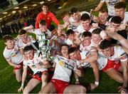 22 April 2022; Tyrone players celebrate with the cup after the EirGrid Ulster GAA Football U20 Championship Final match between Cavan and Tyrone at Brewster Park in Enniskillen, Fermanagh. Photo by David Fitzgerald/Sportsfile