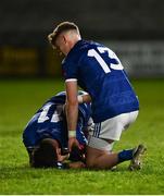 22 April 2022; Fionntán O'Reilly of Cavan is consoled by team mate Darragh Lovett after the EirGrid Ulster GAA Football U20 Championship Final match between Cavan and Tyrone at Brewster Park in Enniskillen, Fermanagh. Photo by David Fitzgerald/Sportsfile
