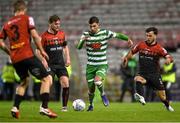 22 April 2022; Danny Mandroiu of Shamrock Rovers in action against Conor Levingston, left, and Jordan Doherty of Bohemians during the SSE Airtricity League Premier Division match between Bohemians and Shamrock Rovers at Dalymount Park in Dublin. Photo by Seb Daly/Sportsfile