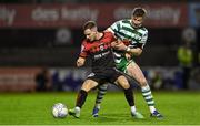 22 April 2022; Liam Burt of Bohemians in action against Ronan Finn of Shamrock Rovers during the SSE Airtricity League Premier Division match between Bohemians and Shamrock Rovers at Dalymount Park in Dublin. Photo by Seb Daly/Sportsfile