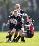 23 April 2022; Sorcha barcoe Keogh of Kilkenny RFC is tackled by Eileen Shanahan of Tallaght RFC during the Division 5 Cup Final match between Kilkenny RFC and Tallaght RFC at Ollie Campbell Park, Old Belvedere RFC in Dublin. Photo by Ben McShane/Sportsfile