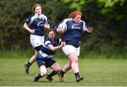 23 April 2022; Rosie Palmer of Portlaoise RFC is tackled by Kate Foley of Wanderers RFC during the Paul Cusack Plate Final match between Portlaoise RFC and Wanderers RFC at Ollie Campbell Park, Old Belvedere RFC in Dublin. Photo by Ben McShane/Sportsfile