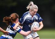23 April 2022; Jenny Keegan of Portlaoise RFC is tackled by Nicole Landy of Wanderers RFC during the Paul Cusack Plate Final match between Portlaoise RFC and Wanderers RFC at Ollie Campbell Park, Old Belvedere RFC in Dublin. Photo by Ben McShane/Sportsfile