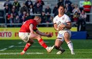 22 April 2022; James Hume of Ulster is tackled by Keith Earls of Munster during the United Rugby Championship match between Ulster and Munster at Kingspan Stadium in Belfast. Photo by John Dickson/Sportsfile