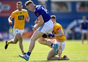 23 April 2022; Paddy Lynch of Cavan in action against Peter Healy of Antrim during the Ulster GAA Football Senior Championship Quarter-Final match between Antrim and Cavan at Corrigan Park in Belfast. Photo by Ramsey Cardy/Sportsfile