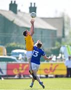 23 April 2022; Dermot McAleese of Antrim in action against Cormac O'Reilly of Cavan during the Ulster GAA Football Senior Championship Quarter-Final match between Antrim and Cavan at Corrigan Park in Belfast. Photo by Ramsey Cardy/Sportsfile