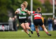 23 April 2022; Amy Horan of Naas RFC is tackled by Aoibhin Stone of Wicklow J1 during the Paul Cusack Cup Final match between Wicklow J1 and Naas RFC at Ollie Campbell Park, Old Belvedere RFC in Dublin. Photo by Ben McShane/Sportsfile