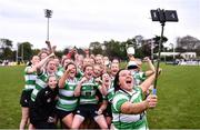 23 April 2022; Ellen Murray of Naas RFC takes a 'selfie' with her teammates and the cups after the Paul Cusack Cup Final match between Wicklow J1 and Naas RFC at Ollie Campbell Park, Old Belvedere RFC in Dublin. Photo by Ben McShane/Sportsfile