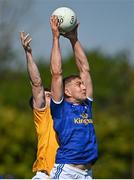 23 April 2022; Killian Clarke of Cavan in action against Kevin Small of Antrim during the Ulster GAA Football Senior Championship Quarter-Final match between Antrim and Cavan at Corrigan Park in Belfast. Photo by Ramsey Cardy/Sportsfile